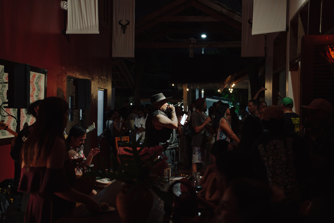 A musician performing for guests at Wild Siargao
