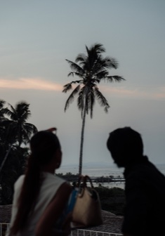 A couple watching the sunset at Burgos