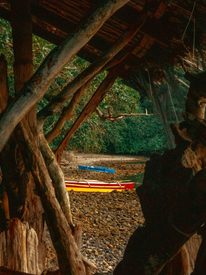 Boats stored beneath a shelter